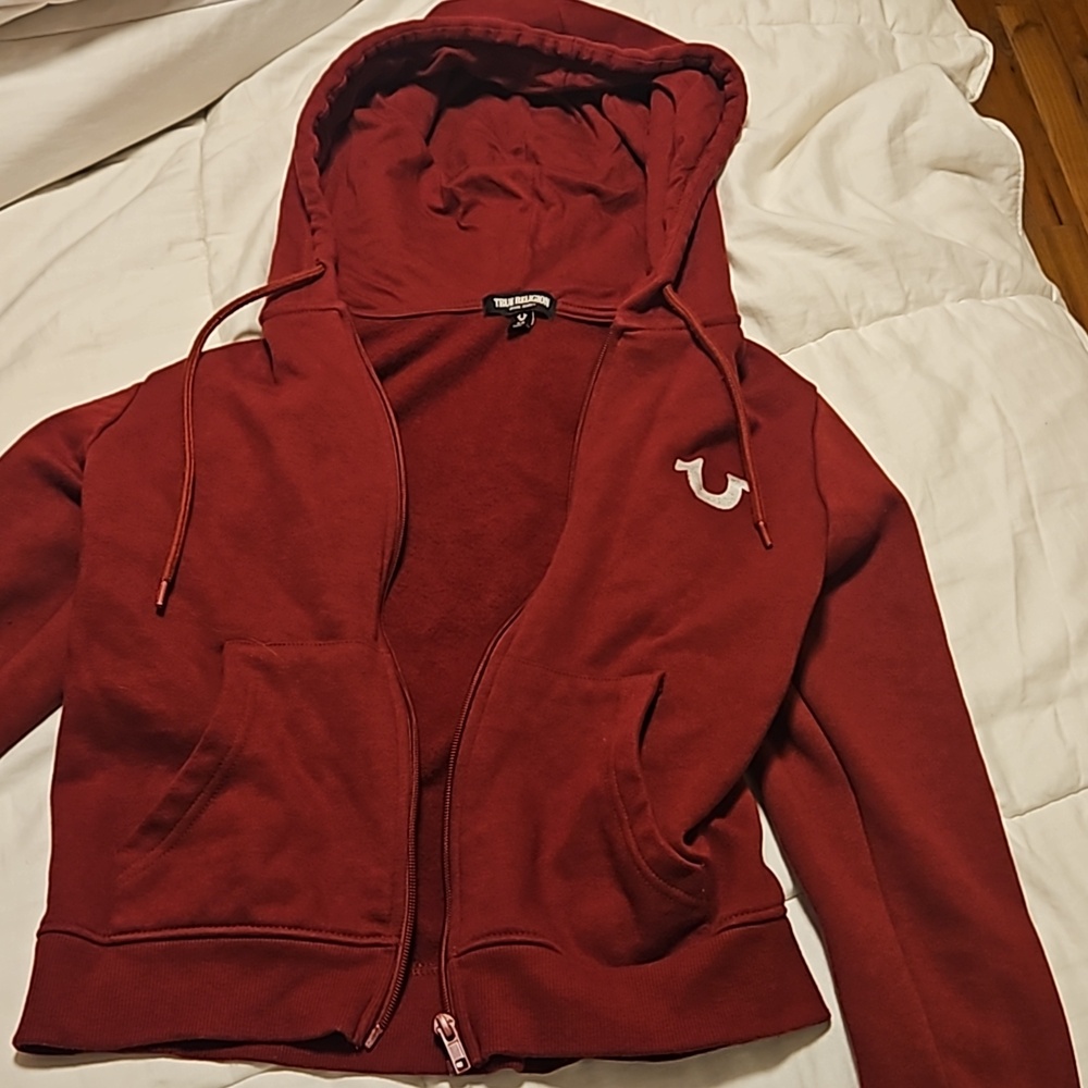 Color is burgundy red true religion sweater never worn size small